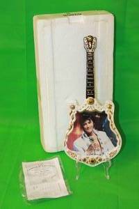 lot 103 image: ELVIS PRESLEY  1971,THE ENCORE  EIGHT ISSUE IN ENTERTAINER OF THE CENTURY COLLECTION GUITAR PLATE No A01889, WITH COA ,13