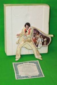 lot 105 image: ELVIS PRESLEY A SHIMMERING LEGACY FIRST ISSUE IN HIS LEGEND LIVES ON COLLECTION ,No A0540,WITH COA ,9 H