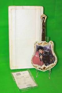 lot 108 image: ELVIS PRESLEY  THE COMEBACK ENTERTAINER TWELFTH ISSUE IN ENTERTAINER OF THE CENTURY GUITAR PLATE No A01778,WITH COA, 13 H