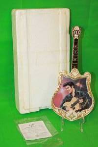 lot 111 image: ELVIS PRESLEY  THE HOMETOWN HERO TENTH ISSUE IN ENTERTAINER OF THE CENTURY GUITAR PLATE No A02912,WITH COA , 13