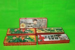 lot 114 image: TOTAL OF 5 VINTAGE ELVIS PRESLEY RUSSELL STOVER HOLIDAY COLLECTION  MILITARY CHRISTMAS CANDY TINS ( 12L)