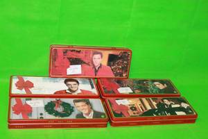 lot 115 image: TOTAL OF 5 VINTAGE ELVIS PRESLEY RUSSELL STOVER HAPPY HOLIDAY  ELVIS CHRISTMAS CANDY TINS (12L)