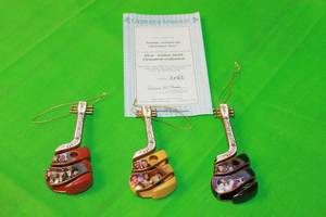 lot 124 image: THE BRADFORD EXCHANGE ELVIS PRESLEY SWIRLIN AROUND THE CHRISTMAS TREE No A0365 , GUITAR ORNAMENTS,WITH COA
