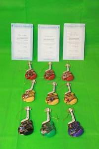 lot 127 image: TOTAL OF 9 (SET OF 3)THE BRADFORD EXCHANGE ELVIS PRESLEY HAPPY HOLIDAY,CHRISTMAS ROCK,SANTA CLAUS ROCK, CHRISTMAS GUITAR ORNAMENTS WITH COA