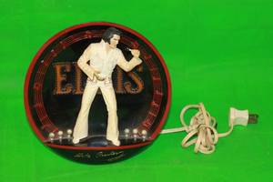 lot 128 image: ELVIS PRESLEY IN THE SPOTLIGHT ON STAGE IN HAWAII No B7503, 9H