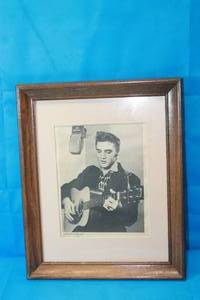 lot 146 image: ELVIS PRESLEY IN NEW YORK DEC 1,1955 AT RCA VICTOR STUDIO ,NEWS PAPER CLIPPING FRAMED ( 17 X 13)