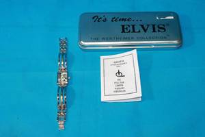 lot 156 image: ELVIS PRESLEY WATCH,BY THE WERTHEIMER COLLECTION WITH CASE