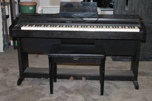 lot 99 image: KURZWEIL ENSEMBLE GRANDE MARK III  EG111 ( POWER ON NEEDS WORK )