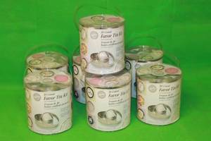 lot 166 image: TOTAL OF 7 WILTON FAVOR TIN KITS  30 COUNT PER CONTAINER
