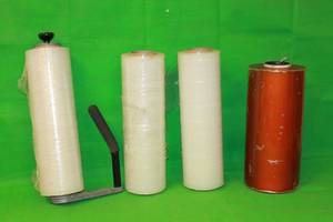 lot 217 image: TOTAL OF 4 STRETCH RAPS TRANSPARENT PACKAGING WITH HIGHLIGHT  INDUSTRIES STRETCH WRAP DISPENSER