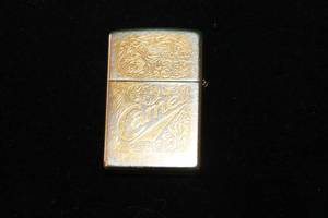 lot 15 image: 1995 GOLD TONE CAMEL ZIPPO LIGHTER