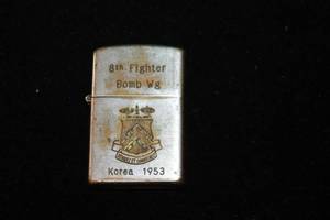 lot 16 image: KOREA 1953 8TH FIGHTER BOMB ZIPPO STYLE LIGHTER