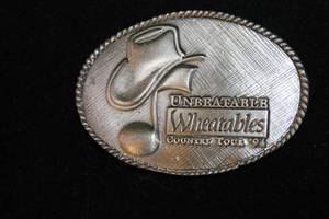 lot 19 image: VINTAGE 1994 MUSIC FESTIVAL BELT BUCKLE