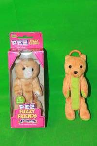 lot 102 image: 2 VINTAGE COLLECTABLES PEZ FUZZY FRIENDS CUDDLY CANDY DISPENSERS