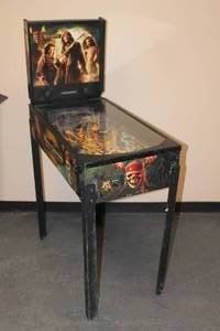 lot 138 image: DISNEY PIRATES OS THE CARIBBEAN DEAD MANS CHEST PINBALL ARCADE GAME TESTED AND WORKS POWER CORD NOT INCLUDED