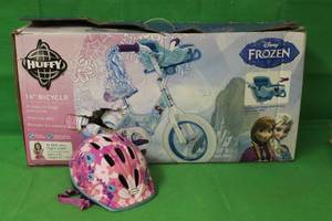 lot 142 image: HUFFY DISNEY FROZEN 14 BICYCLE WITH DOLL CRRIER AND SCHWINN HELMET