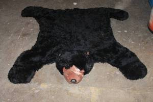 lot 209 image: BEAR AREA RUG