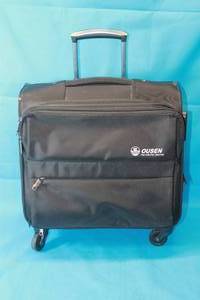 lot 252 image: OLSEN ROLLING SUITCASE