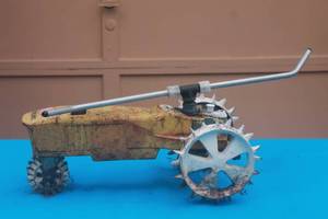 lot 9 image: VINTAGE NELSON TRAVELING CAST IRON SPRINKLER RAIN TRAIN