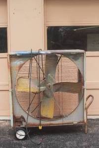 lot 19 image: VINTAGE METAL INDUSTRIAL ELECTRIC BOX FAN  ON CASTERS 47 H X 41L