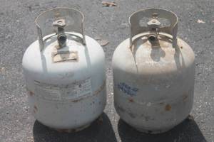 lot 46 image: TOTAL OF 2 PROPANE TANKS BOTH ARE HALF FULL