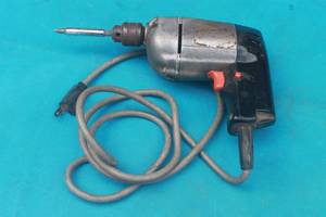 lot 55 image: VINTAGE BLACK & DECKER DRILL