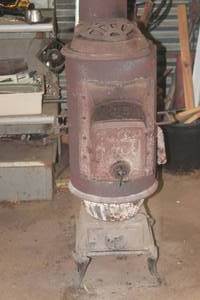 lot 65 image: VINTAGE  1880S  SILVER OAK 213 CAST IRON COAL BURNING PARLOR STOVE