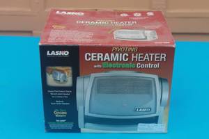 lot 90 image: LASKO PIVOTING CERAMIC HEATER WITH ELECTRONIC CONTROL 5965