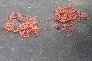 lot 160 image: TOTAL OF 2 ORANGE  EXTENSION CORDS
