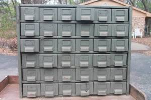 lot 188 image: ANTIQUE 36-DRAWER APOTHECARY STORAGE METAL  CABINET WITH GENEROUS AMOUNT OF CONTENTS , 30L X 24.5 H , SEE PICS