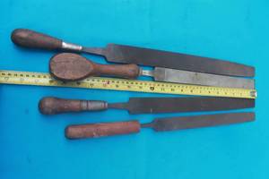 lot 204 image: TOTAL OF 4 WOOD HANDLE  FILES , 20- 23