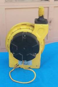 lot 253 image: AERO -MOTIVE WOODHEAD  CORD REEL MODEL RI51  WITH EXTENSION CORD