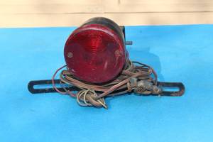 lot 323 image: TAIL LIGHT  MAYBE FOR ATVTRAILER