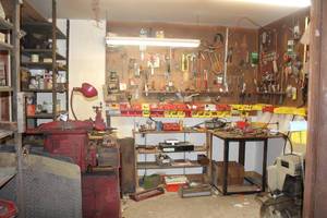 lot 450 image: ENTIRE ROOM OF TOOLS WALL SHELF FLOOR TAKE THE GOODIES LEAVE THE TRASH.