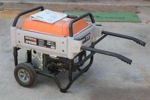 lot 103 image: BARELY USED GENERAC XP800E PORTABLE GENERATOR WITH MANUAL ONLY 21.6 HR OURS OF USE.