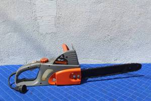 lot 85 image: REMINGTON 16 , 12AMP CHAIN SAW , RM1635W