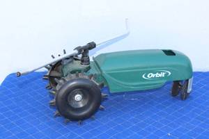lot 127 image: CAST IRON ORBIT MOBILE SPRINKLER