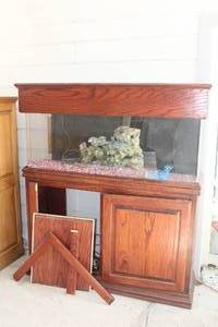 lot 188 image: LARGE FISH TANK WITH PUMP AND ACCESSORIES CABINET DOOR NEEDS WORK