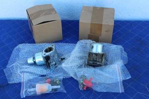 lot 204 image: 2 SMALL ENGINE CARBURETORS