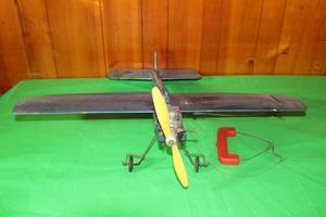 lot 43 image: VINTAGE MODEL AIR PLANE WITH VINTAGE ENYA-15-II MODEL AIRPLANE ENGINE , 23 L X 30 W