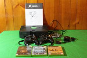 lot 54 image: XBOX VIDEO GAME SYSTEM ,2-XBOX CONTROLLERS ,3-XBOX GAMES AND PELICAN WIRELESS  RECEIVER ADAPTER
