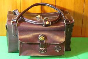 lot 59 image: VINTAGE MULHOLLAND BROTHERS  LONGHORN  LEATHER WEEKEND BAG ,15L X 9H