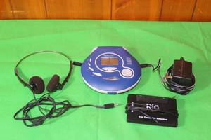 lot 60 image: RIOVOLT DIGITAL AUDIO CD PLAYER HEADPHONE WITH RIO CAR CASSETTE ADAPTER SP90