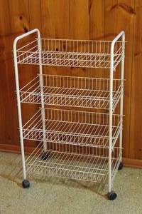 lot 107 image: 4-TIER SHELF  WIRE LAUNDRY UTILITY  ROLLING RACK CART ON CASTER WHEELS , 37 H X 22L