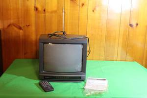 lot 132 image: VINTAGE SHARK COLOR TELEVISION 13A -M100 WITH REMOTE & MANUAL
