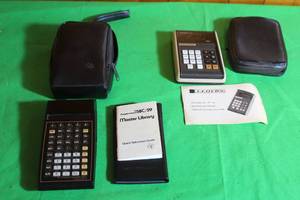 lot 152 image: VINTAGE TEXAS INSTRUMENT TI PROGRAMMABLE 58C CALCULATORS LLOYDS AUTOMATIC 30 MICRO ELECTRONIC CALCULATOR WITH MANUALS & STORAGE CASES