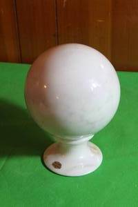 lot 189 image: ONYX TELLER MARBLE BALL WITH PEDESTAL STAND