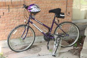lot 303 image: PARADISE PACIFICPURPLE BIKE WITH HELMET AND HAND PUMP