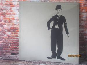lot 145 image: CHARLIE CHAPLIN IKEA CANVAS - ARTIST PHIL HANDSLEY&nbsp