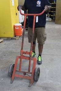 lot 10 image: STEEL DRUM LIFTER TRUCK